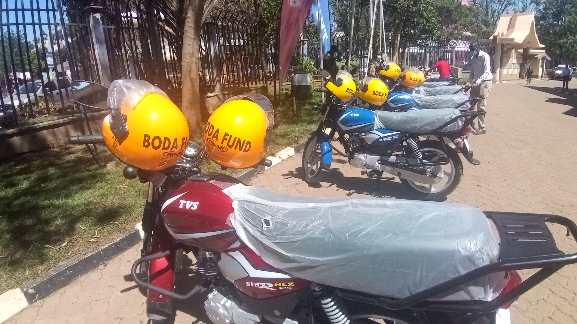 Boda Fund motorcycle and branded helmet
